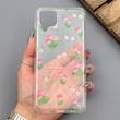قاب گوشی Galaxy A12 - M12 سامسونگ شفاف پشت طلقی شیشه‌ای دور ژله ای طرح گل لاله