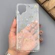 قاب گوشی Galaxy A12 - M12 سامسونگ شفاف پشت طلقی شیشه‌ای دور ژله ای طرح گل