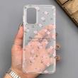 قاب گوشی Galaxy A13 4G - A04S سامسونگ شفاف پشت طلقی شیشه‌ای دور ژله ای طرح گل صورتی