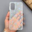 قاب گوشی Galaxy A13 4G - A04S سامسونگ شفاف پشت طلقی شیشه‌ای دور ژله ای طرح گل آبی