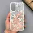 قاب گوشی Galaxy A15 سامسونگ شفاف پشت طلقی شیشه‌ای دور ژله ای طرح گل سفید