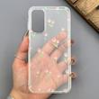 قاب گوشی Galaxy A15 سامسونگ شفاف پشت طلقی شیشه‌ای دور ژله ای طرح گل لاله 
