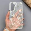 قاب گوشی Galaxy A16 سامسونگ شفاف پشت طلقی شیشه‌ای دور ژله ای طرح گل سفید