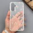 قاب گوشی Galaxy A17 سامسونگ شفاف پشت طلقی شیشه‌ای دور ژله ای طرح گل لاله