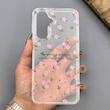قاب گوشی Galaxy A17 سامسونگ شفاف پشت طلقی شیشه‌ای دور ژله ای طرح گل صورتی