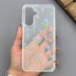 قاب گوشی Galaxy A17 سامسونگ شفاف پشت طلقی شیشه‌ای دور ژله ای طرح گل آبی