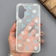 قاب گوشی Galaxy A26 سامسونگ شفاف پشت طلقی شیشه‌ای دور ژله ای طرح گل آبی