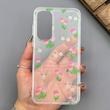 قاب گوشی Galaxy A35 سامسونگ شفاف پشت طلقی شیشه‌ای دور ژله ای طرح گل لاله