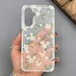 قاب گوشی Galaxy A36 سامسونگ شفاف پشت طلقی شیشه‌ای دور ژله ای طرح گل سفید