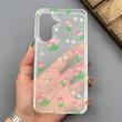 قاب گوشی Galaxy A37 سامسونگ شفاف پشت طلقی شیشه‌ای دور ژله ای طرح گل لاله 