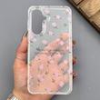 قاب گوشی Galaxy A37 سامسونگ شفاف پشت طلقی شیشه‌ای دور ژله ای طرح گل صورتی