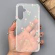 قاب گوشی Galaxy A54 سامسونگ شفاف پشت طلقی شیشه‌ای دور ژله ای طرح گل لاله