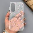 قاب گوشی Galaxy A55 سامسونگ شفاف پشت طلقی شیشه‌ای دور ژله ای طرح گل صورتی