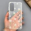 قاب گوشی Galaxy A55 سامسونگ شفاف پشت طلقی شیشه‌ای دور ژله ای طرح گل بابونه