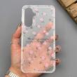 قاب گوشی Galaxy A56 سامسونگ شفاف پشت طلقی شیشه‌ای دور ژله ای طرح گل صورتی