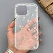 قاب گوشی iPhone 16 Pro Max آیفون شفاف پشت طلقی شیشه‌ای دور ژله ای طرح گل لاله