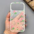قاب گوشی iPhone 17 Pro Max آیفون شفاف پشت طلقی شیشه‌ای دور ژله ای طرح گل لاله