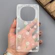 قاب گوشی Redmi Note 14 Pro 4G شیائومی شفاف پشت طلقی شیشه‌ای دور ژله ای طرح گل بابونه