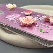 قاب گوشی Galaxy A06 سامسونگ لیزری فانتزی گل برجسته لیلیوم لاکچری TPU رنگ صورتی 