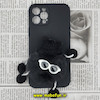قاب گوشی iPhone 12 Pro Max آیفون طرح سیلیکونی ژله ای سه بعدی برجسته عروسکی محافظ لنز دار پام پام پشمالو عینکی مشکی کد 528