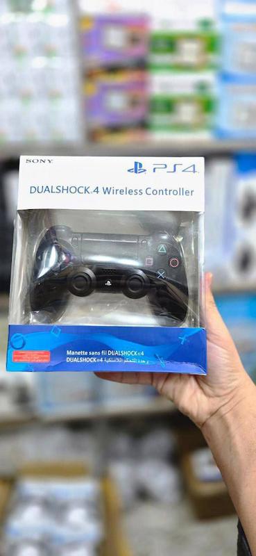 دسته بازی سونی DualShock 4 مشکی | تجربه واقعی هیجان گیمینگ در PS4 و PC (به همراه کابل شارژ)