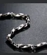 دستبند مردانه زنانه طرح لوکس پیچی استیل تیتانیوم ضد حساسیت