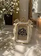 گیفت قاب ولادت امام حسن عسکری (علیه‌السلام) روی میز با نمای سه‌رخ