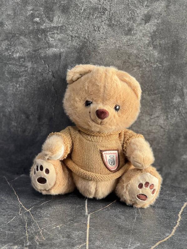 عروسک خرس قهوه ای لباس کاموایی