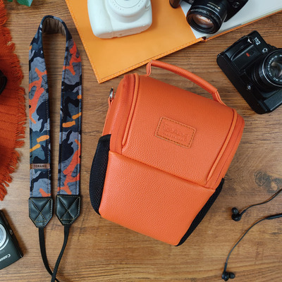 کیف دوربین پوزه ای ترنگ نارنجی