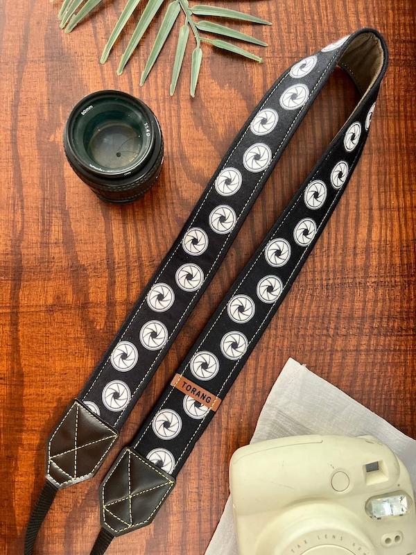 بند دوربین ترنگ طرح دیافراگم لنز