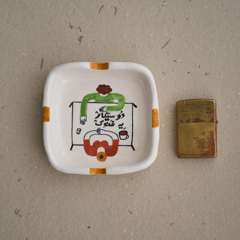 زیرسیگاری دو سیگار یه فندک