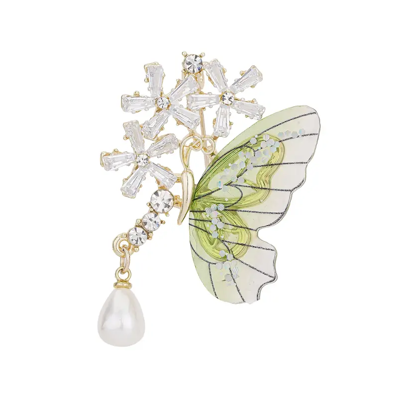 گل سینه, بروچ زنانه, نقرینه, پروانه سبز, اکسسوری مجلسی, گل کریستالی, مروارید آویز, استایل هنری, هدیه زنانه, بروچ فانتزی