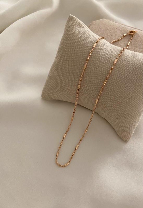 گردنبند خط دار و دو گوی