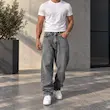 شلوار مردانه جین نیم بگ ساده کد 200289
