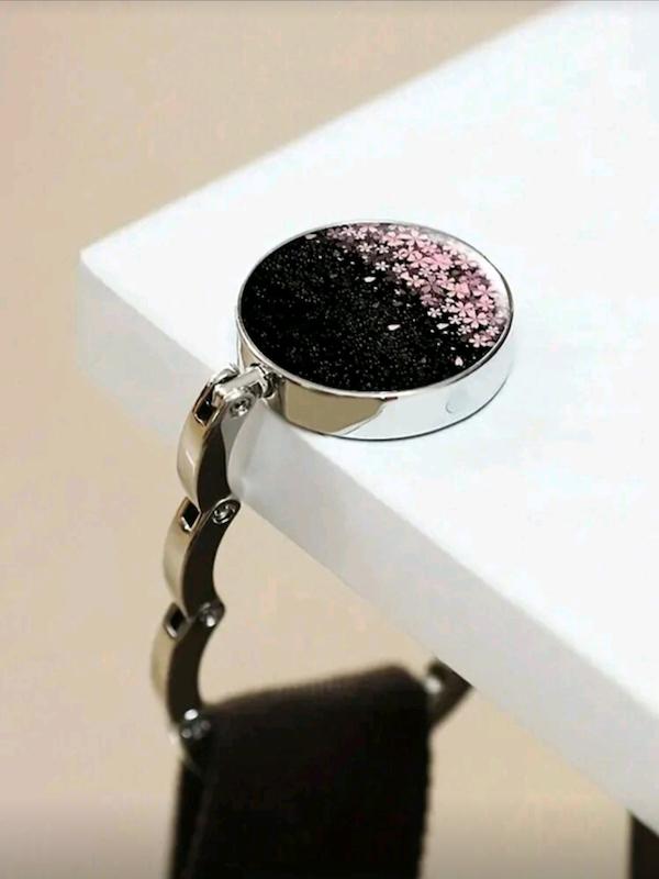 نگه‌دارنده و آویز کیف روی میز مدل مشکی و شکوفه