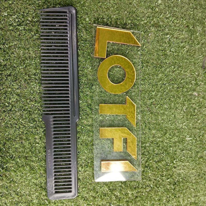 شانه فید مو پلاستیکی مدل دسته دار