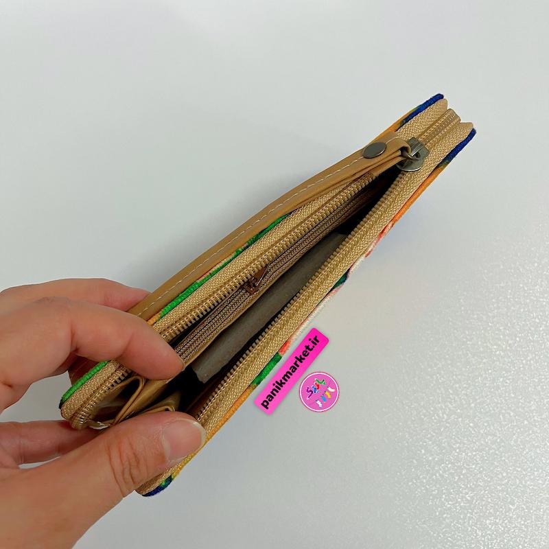 کیف پول طرح شهر رویایی دختر مو نارنجی 🧡