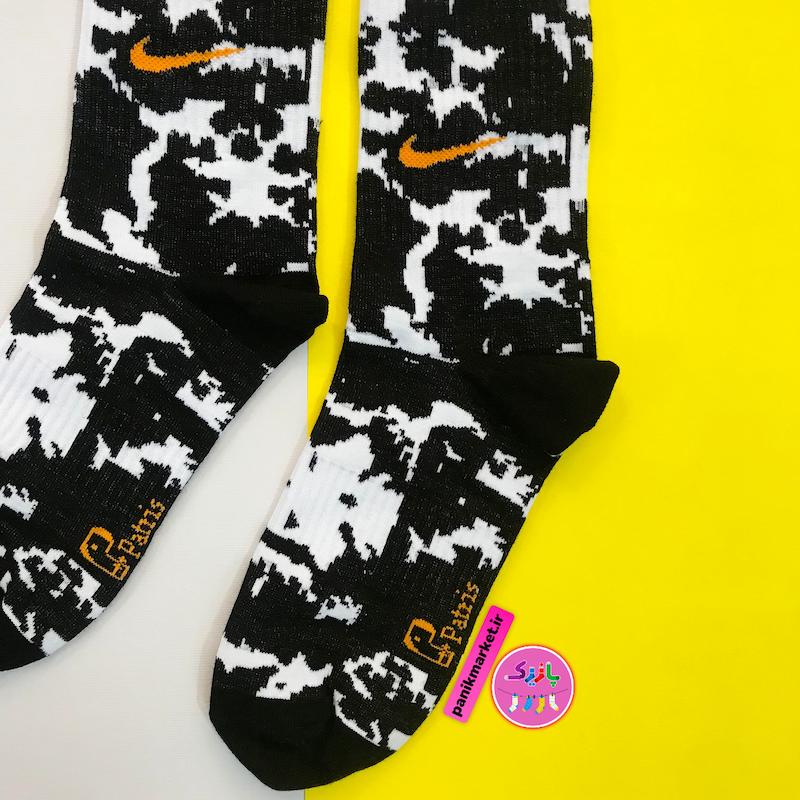 جوراب ساقدار سوپر پنبه نانو فانتزی طرح نایکی (Nike) آبرنگی مشکی-سفید