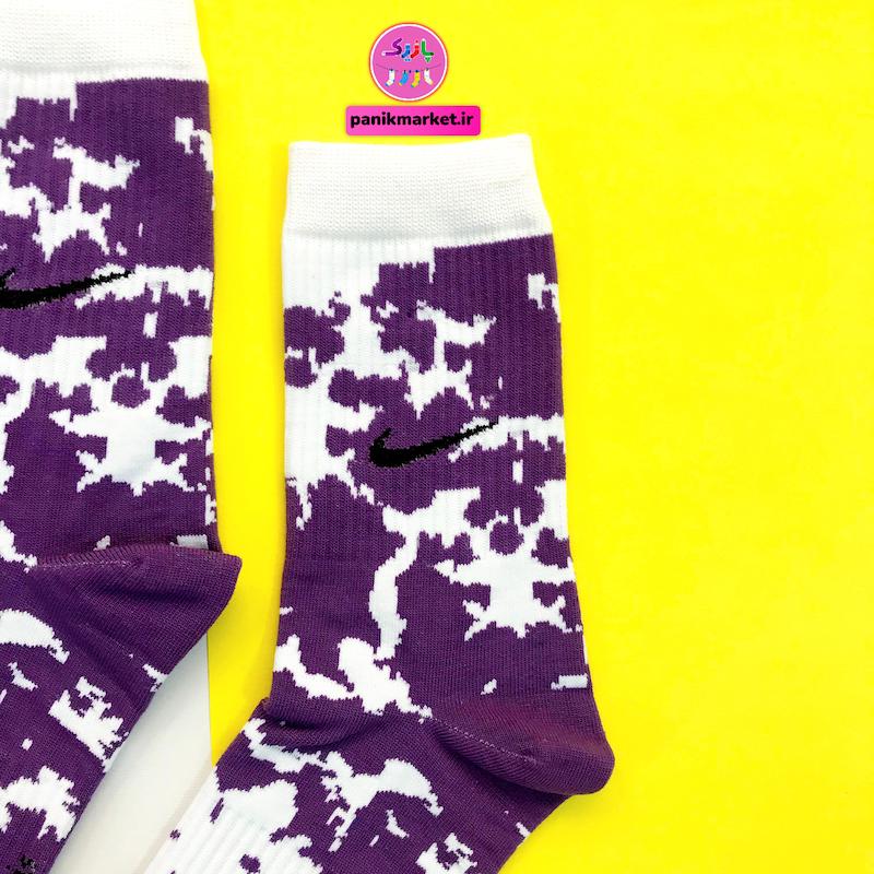 جوراب ساقدار سوپر پنبه نانو فانتزی طرح نایکی (Nike) آبرنگی بنفش-سفید