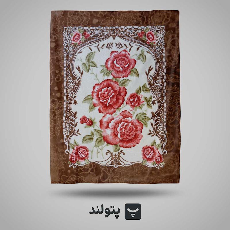 پتو یکنفره گلدار قهوه‌ای با طرح گل قرمز از برند گلبافت، ارائه‌شده در پتولند نمایندگی رسمی بازار تهران؛ گرم، خوش‌دوخت و مناسب برای سبک‌های کلاسیک و سنتی.