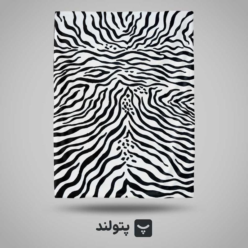 پتو یکنفره طرح گورخری از برند گلبافت، موجود در پتولند نمایندگی رسمی بازار تهران؛ مدرن، خاص و مناسب برای دکوراسیون‌های جسورانه و متفاوت.