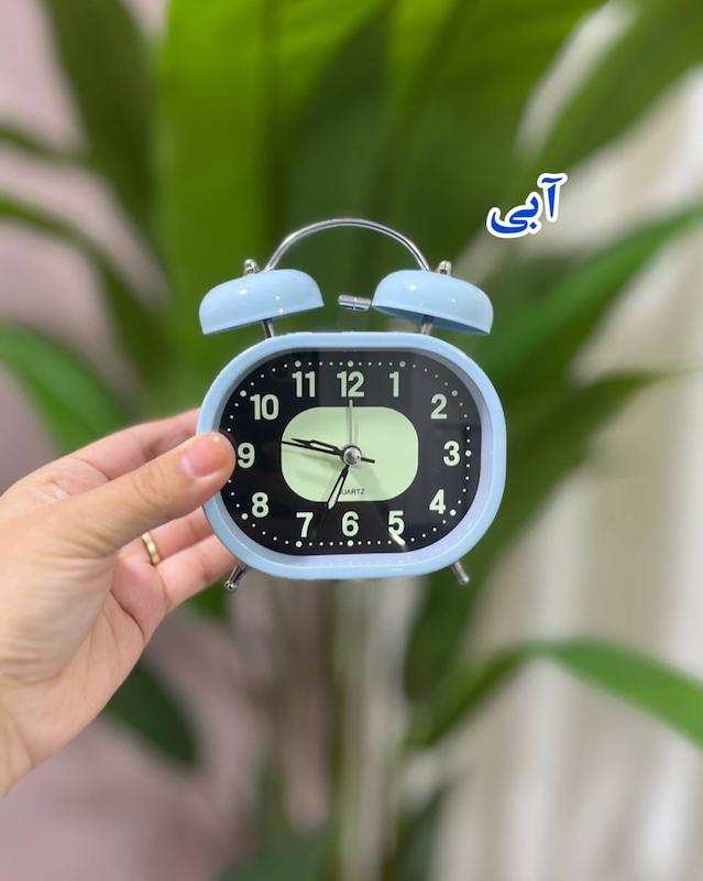 ساعت رومیزی شب نما بیضی چراغدار