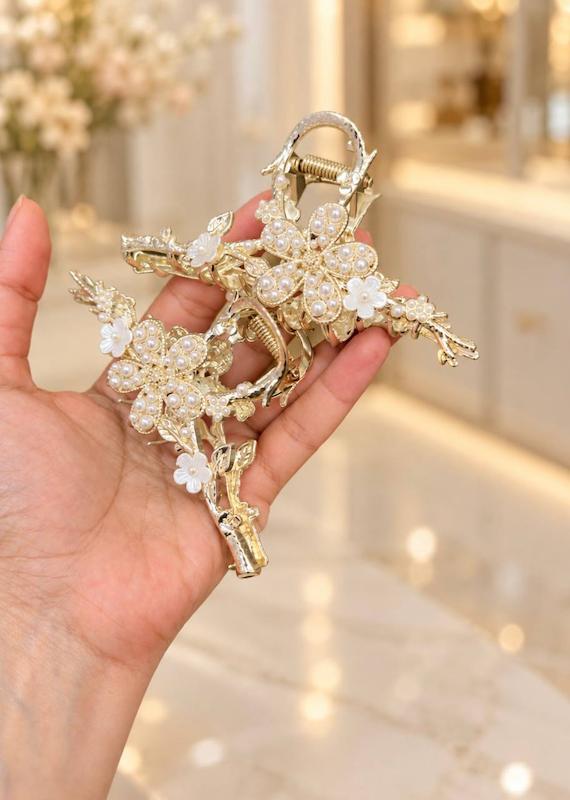 کلیپس مو فلزی طرح گل بابونه 