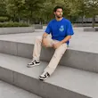 تیشرت مردانه باکسی نخ پنبه طرح گرافیکی گل پرسیسکا