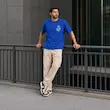 تیشرت مردانه باکسی نخ پنبه طرح گرافیکی گل پرسیسکا