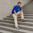 تیشرت مردانه باکسی نخ پنبه طرح گرافیکی گل پرسیسکا
