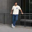 تیشرت مردانه باکسی نخ پنبه طرح گرافیکی گل پرسیسکا