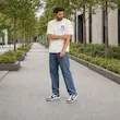 تیشرت مردانه باکسی نخ پنبه طرح گرافیکی گل پرسیسکا