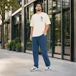 تیشرت مردانه باکسی نخ پنبه طرح گرافیکی گل پرسیسکا
