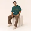 تیشرت مردانه باکسی نخ پنبه طرح گرافیکی ساحلی پرسیسکا